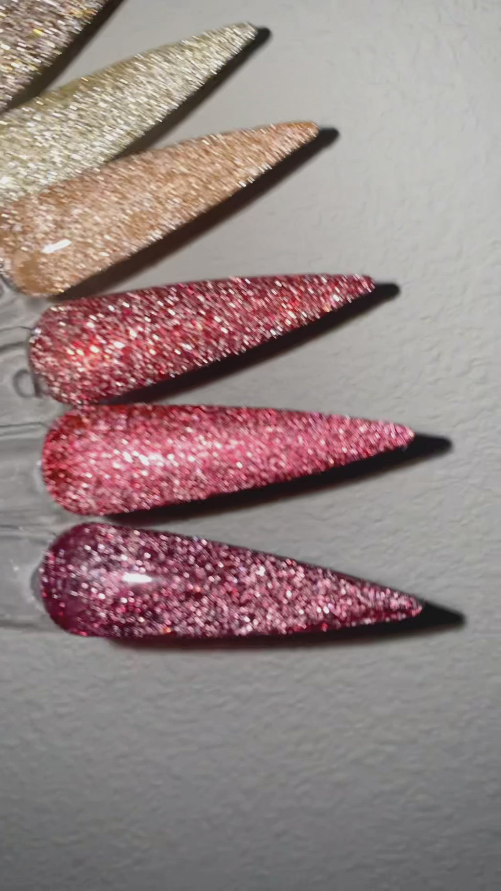 EV Diamond Gel swatch. Video is taken in a dark room with no light, only flash. The set has 18 colors with extremely reflective glitter.